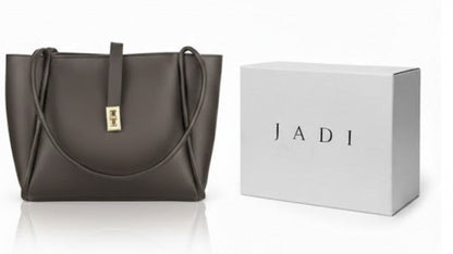 Brown handbag and gray handbag with matching JADI boxes on a white background